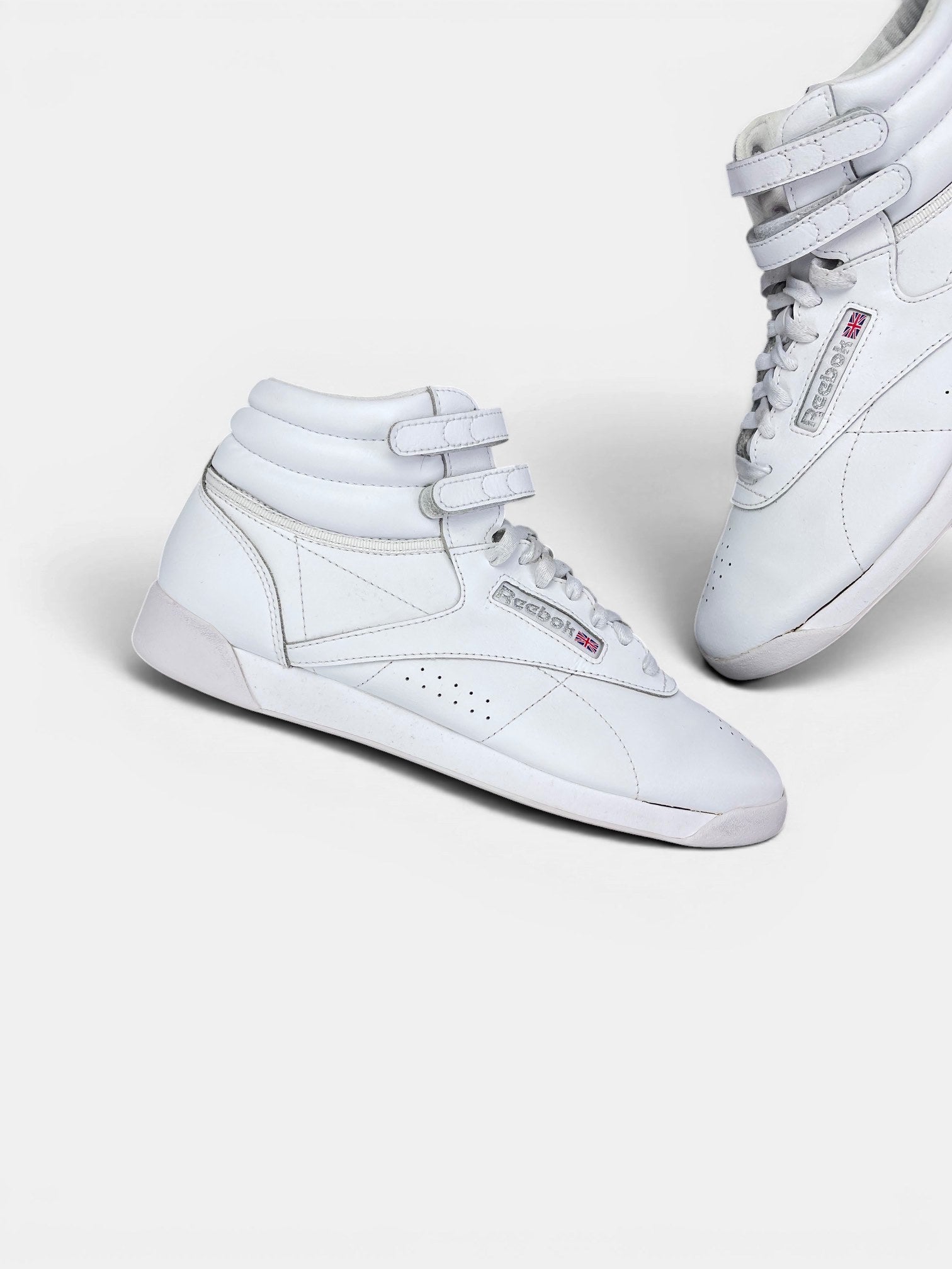 Reebok HiSneakers — buty sportowe damskie w bardzo dobrym stanie rozmiar 40.5, zewnętrzny panel lewego buta