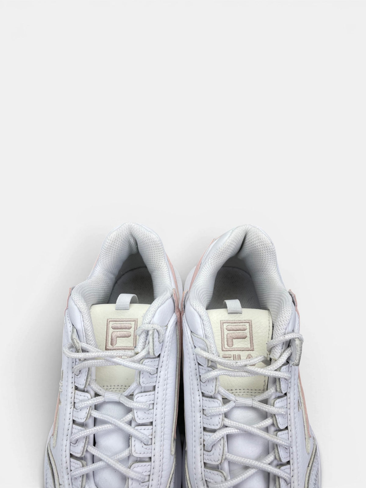 Fila Disruptor — buty sportowe damskie w bardzo dobrym stanie rozmiar 39, zapiętki butów