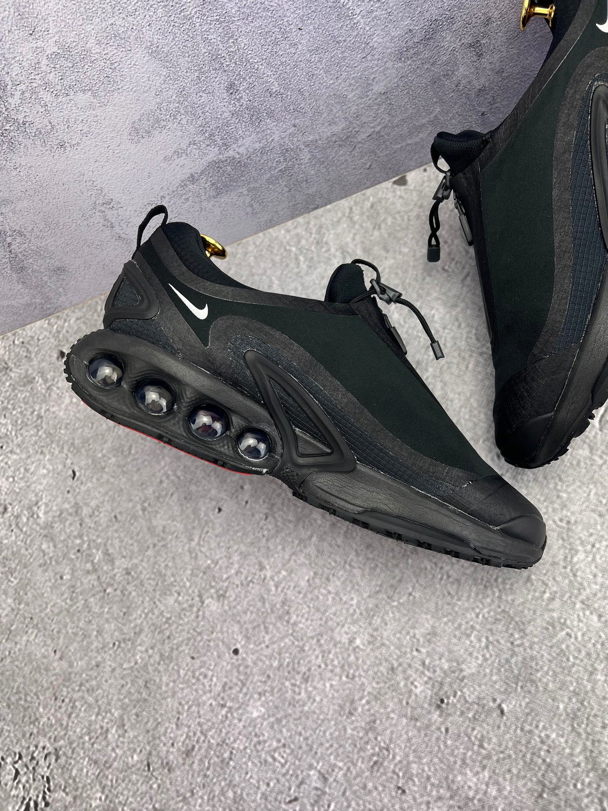 Nike Air Max Dn Roam Triple Black — buty sportowe męskie w bardzo dobrym stanie rozmiar 43, wewnętrzny panel lewego buta