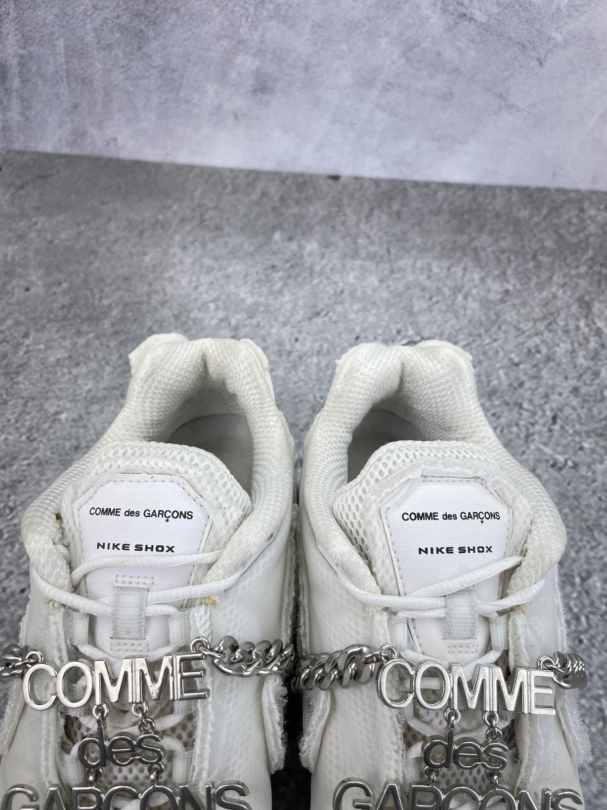Nike Shox TL / CDG Triple White - buty sportowe, zapiętki butów