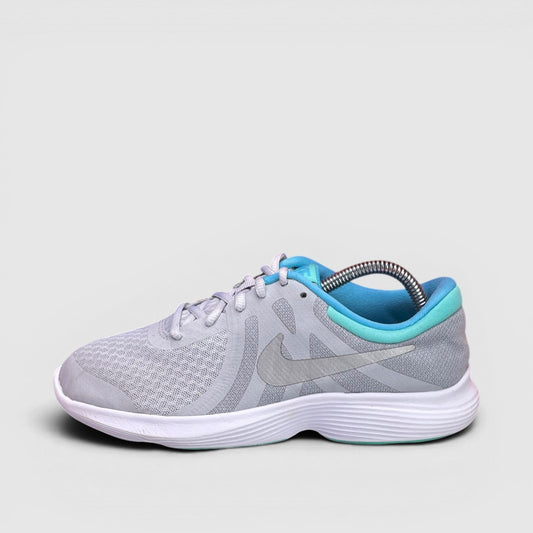 Nike Revolution 4 — buty sportowe damskie w bardzo dobrym stanie rozmiar 37.5, boczny profil, lewa strona