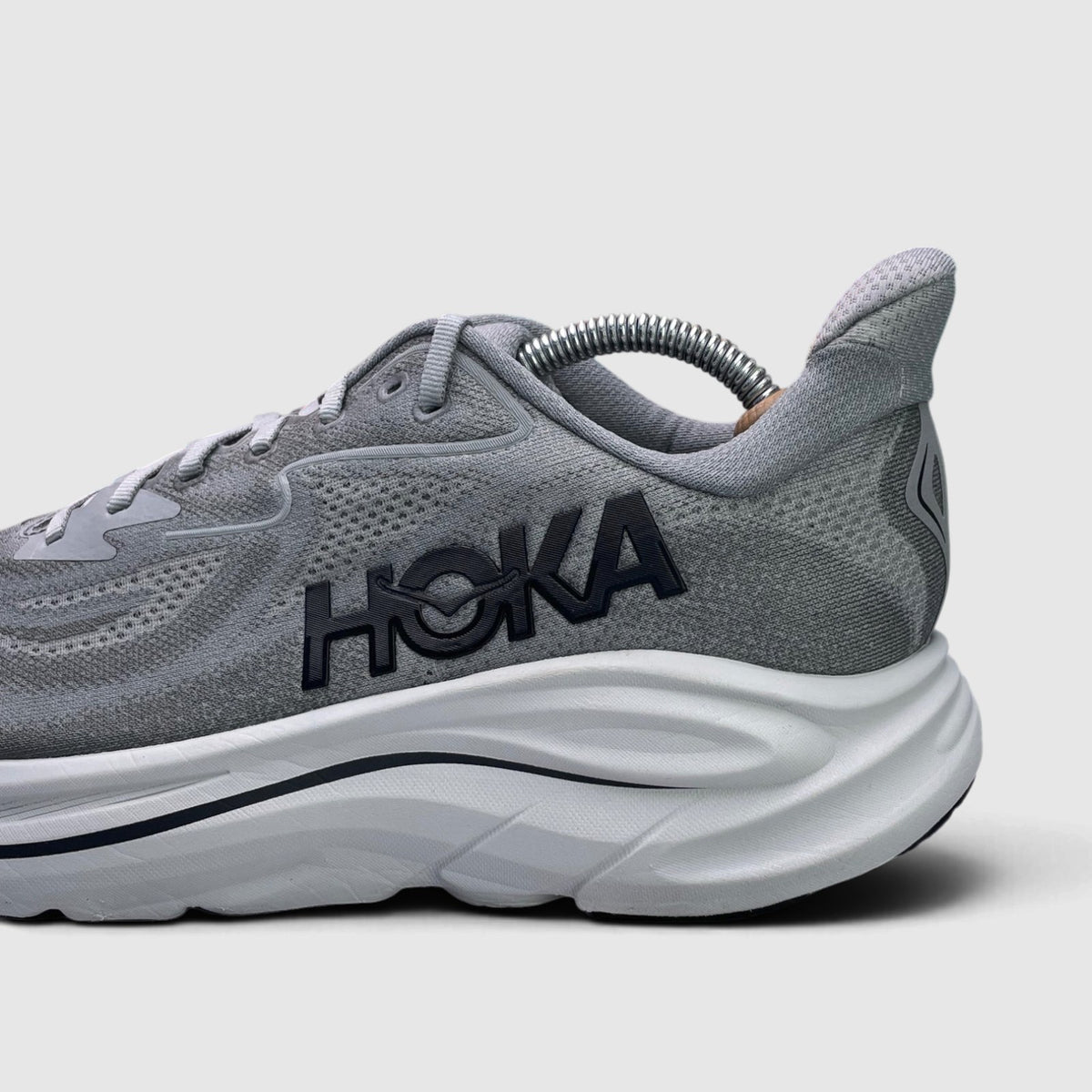 Hoka Clifton 10 Wide, buty sportowe męskie w bardzo dobrym stanie rozmiar 44, boczny profil, lewa strona