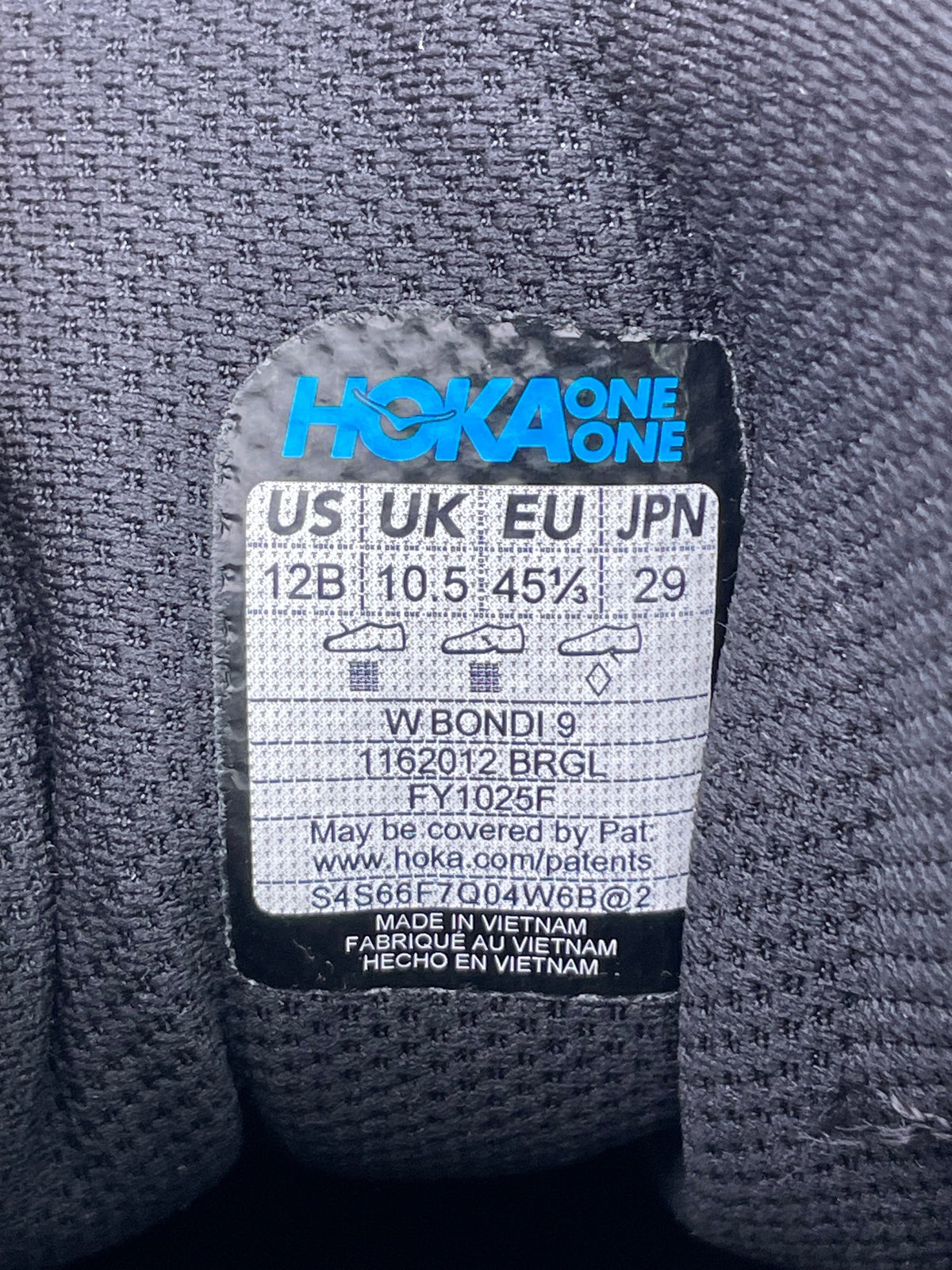 Hoka Bondi 9 — buty sportowe męskie nowe rozmiar 45 1/3, etykieta z kodem modelu 1162012BRGL
