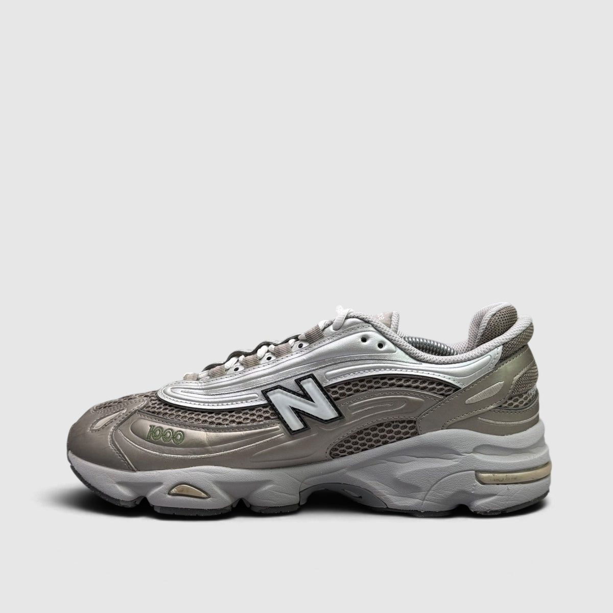 New Balance 1000 Arid Stone, buty sportowe męskie w bardzo dobrym stanie rozmiar 45.5, boczny profil, lewa strona
