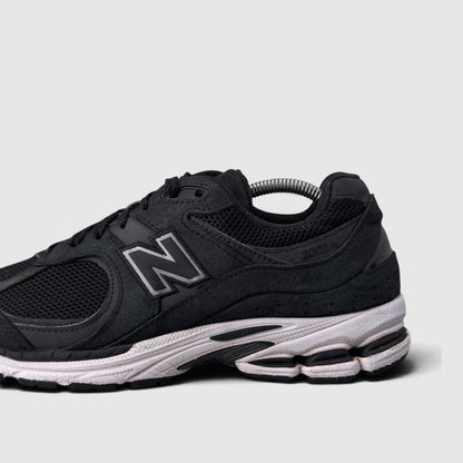 New Balance 2002R, buty sportowe męskie w bardzo dobrym stanie rozmiar 44, boczny profil, lewa strona